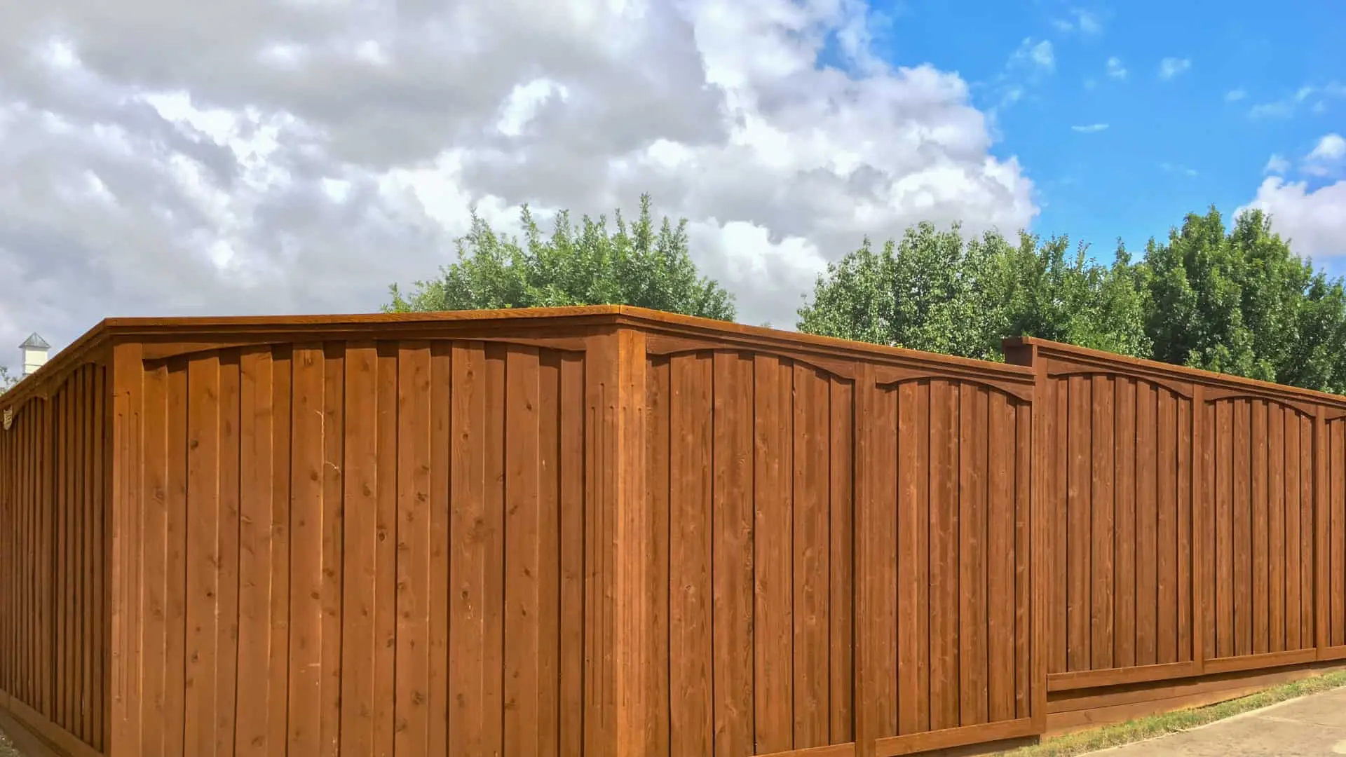 Missouri City Fence Company Dark Stained Wood Fence