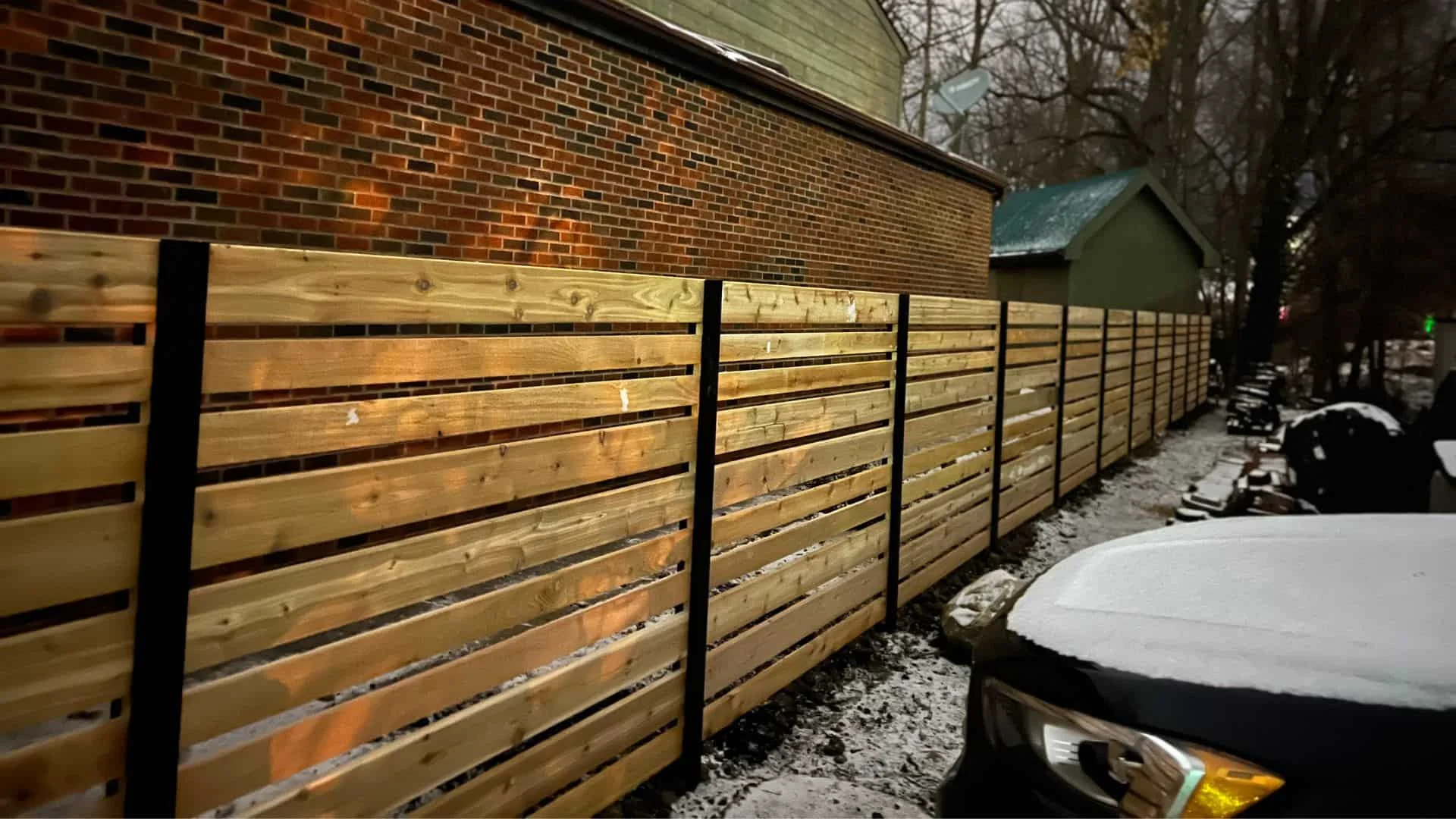 Mixed Media fence using cedar with black aluminum posts