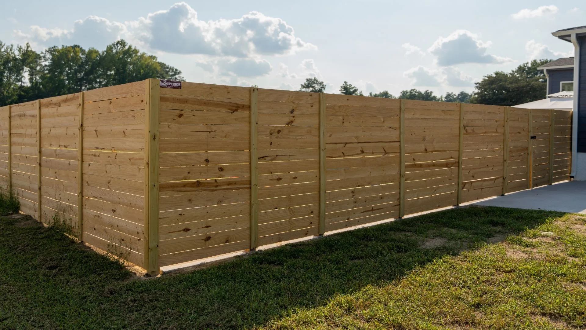 Planning a backyard fence layout to maximize usable space