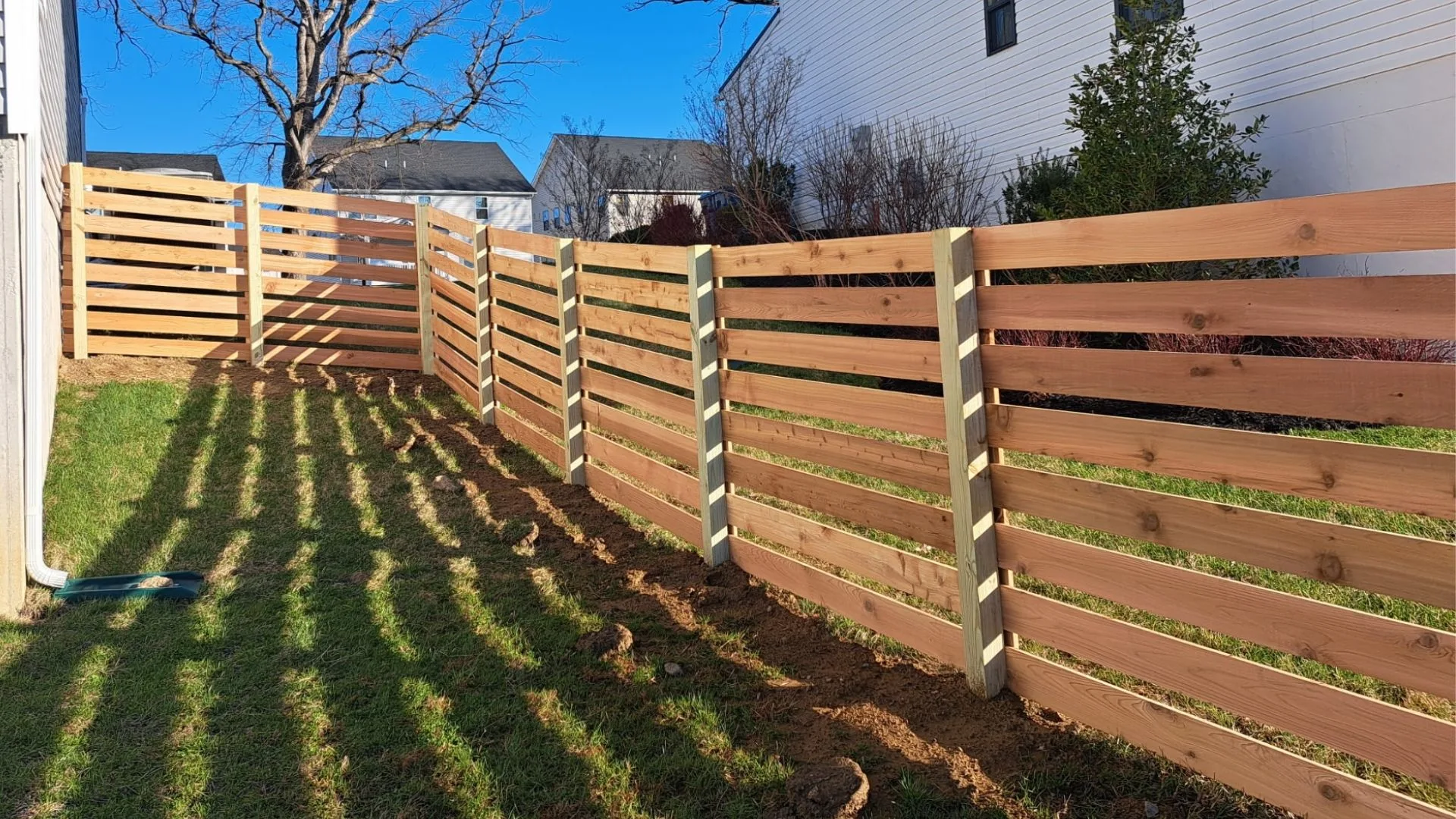 fence a sloped yard in SE Pennsylvania