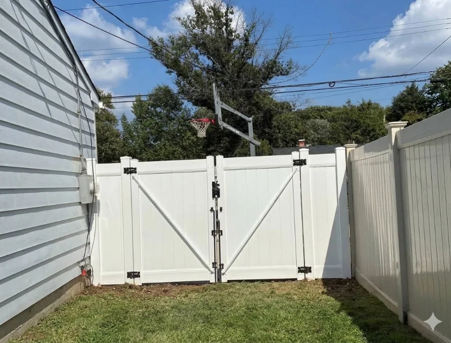 White Vinyl Fence with a Double Gate