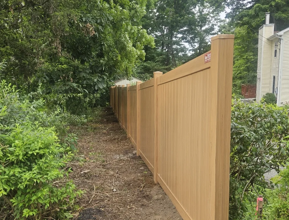 6'H Cypress Hamilton Golden Oak Vinyl Fence